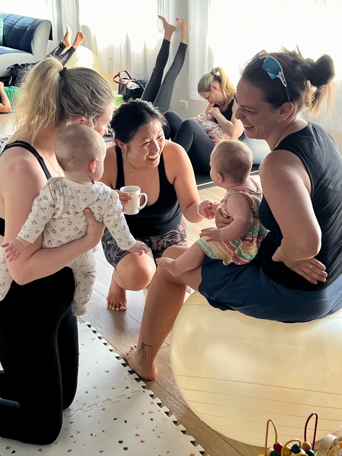 Postnatal yoga class with babies at Evolvere Lane Cove