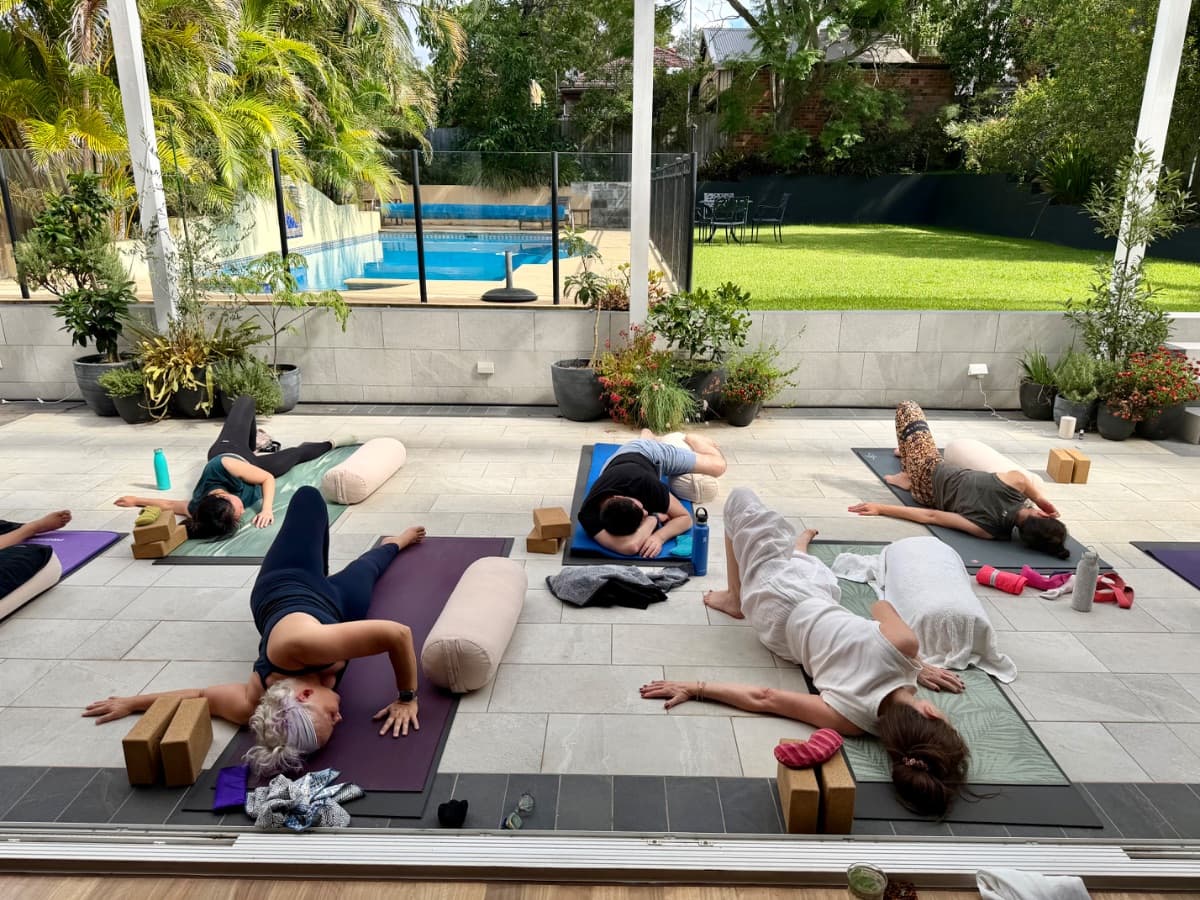 Retreat participants sharing a nourishing seasonal feast together